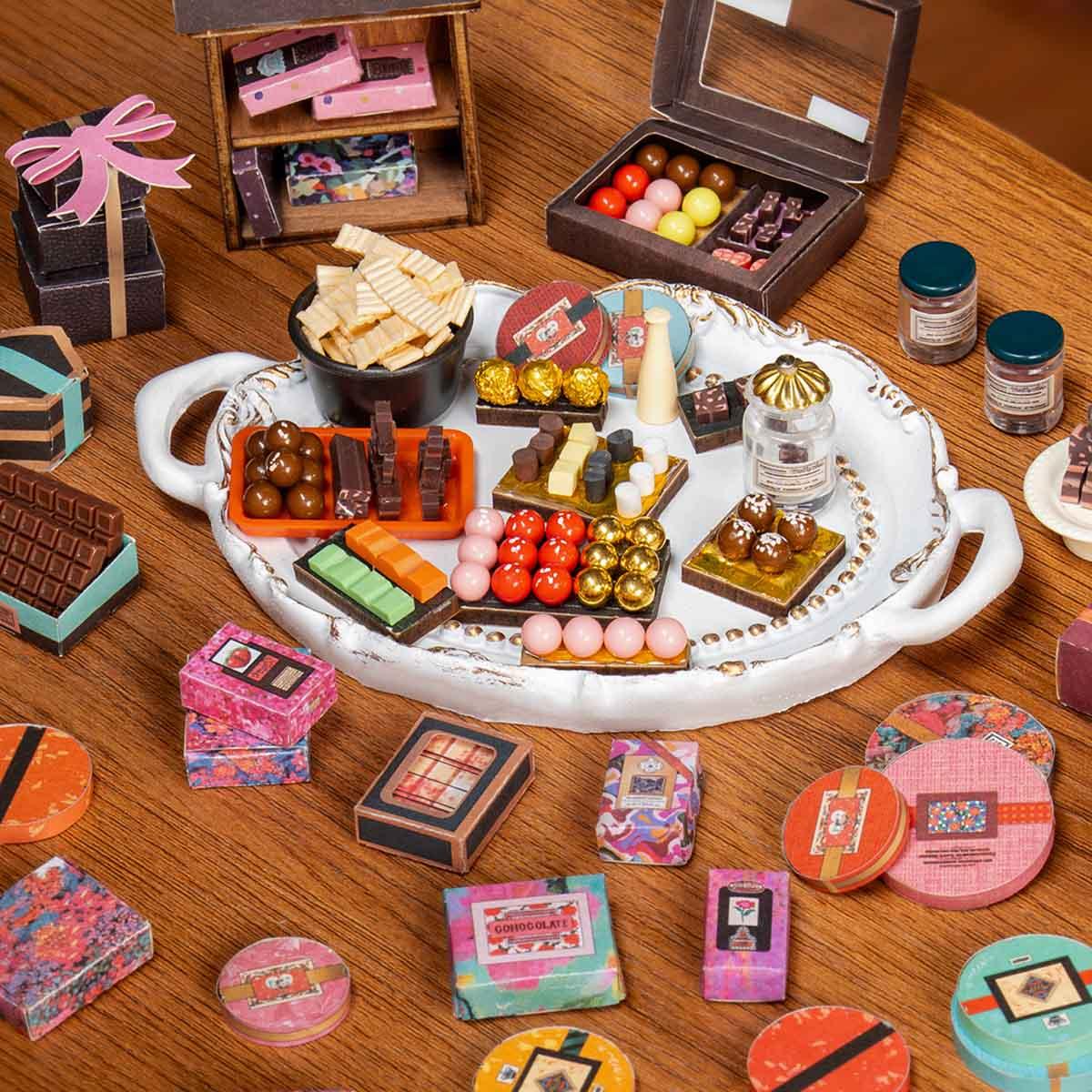 miniature chocolate making equipment and melanger detail inside the wooden diy shop kit for crafters