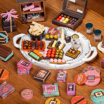 miniature chocolate making equipment and melanger detail inside the wooden diy shop kit for crafters