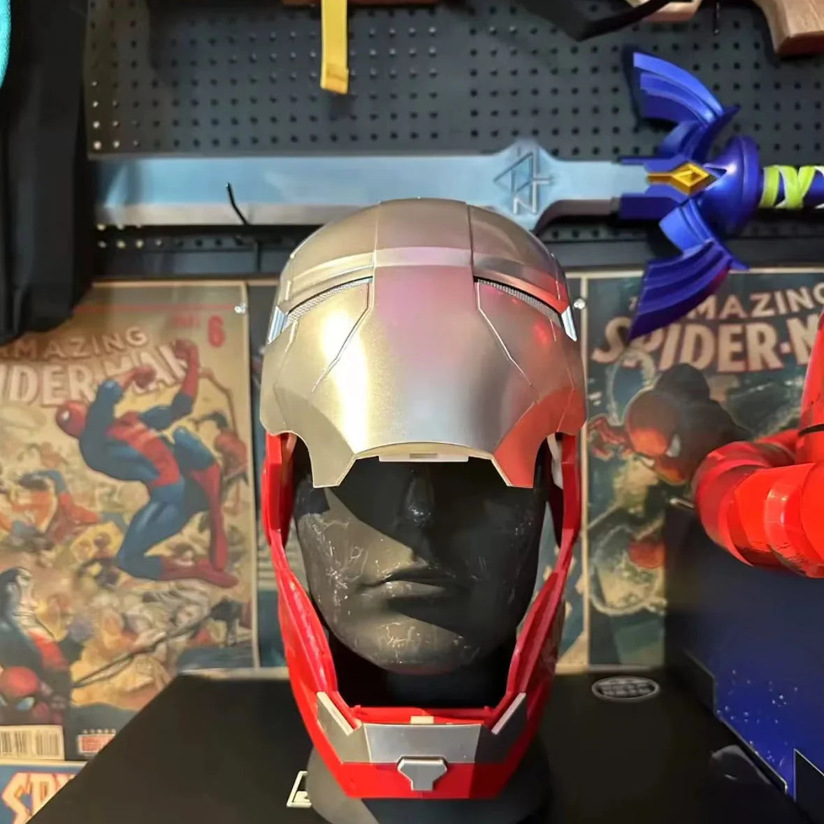 silver iron man helmet faceplate open on display mannequin stark armor mechanism cosplay marvel mark v Silver