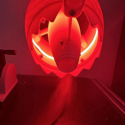 afterburner nozzle close up with LED glow and mist spray, jet engine desk humidifier fan for pilots Red
