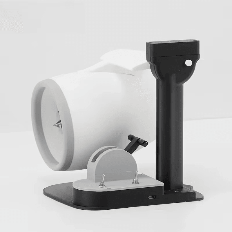 white jet engine desktop fan angled on black stand, aviation decor humidifier for modern office Blue