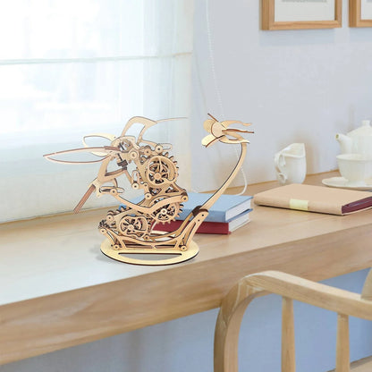 wooden hummingbird model kit on writing desk, calming kinetic motion decor for concentration and screen break relief