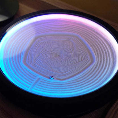 kinetic art table with a magnetic ball tracing hexagonal sand patterns, app-controlled mesmerizing desk decor and zen night light