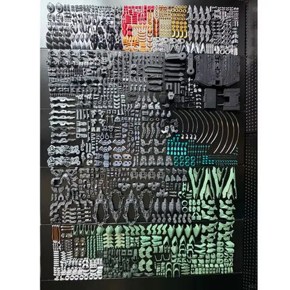 Collection of small, pre-assembled model parts on a display stand.