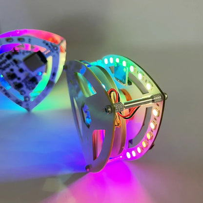 balance triangle robot standing on one edge with rainbow LEDs, motorized flywheel physics gadget Standard, Upgraded