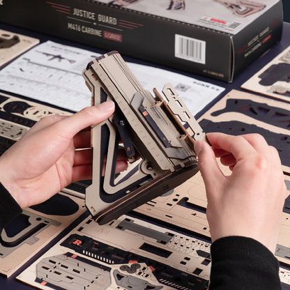 building a 3D wooden gun puzzle by hand from laser-cut plywood sheets, challenging 6 hour model kit hobby project for adults