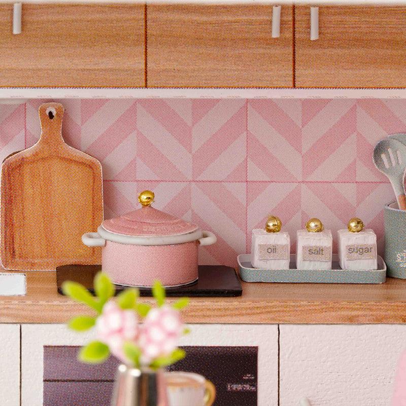 miniature apartment dollhouse pink kitchen close-up with chevron backsplash oil salt sugar containers cookware 1:24 scale diy — Pink