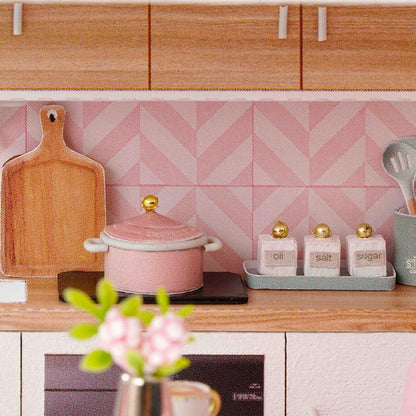 miniature apartment dollhouse pink kitchen close-up with chevron backsplash oil salt sugar containers cookware 1:24 scale diy — Pink