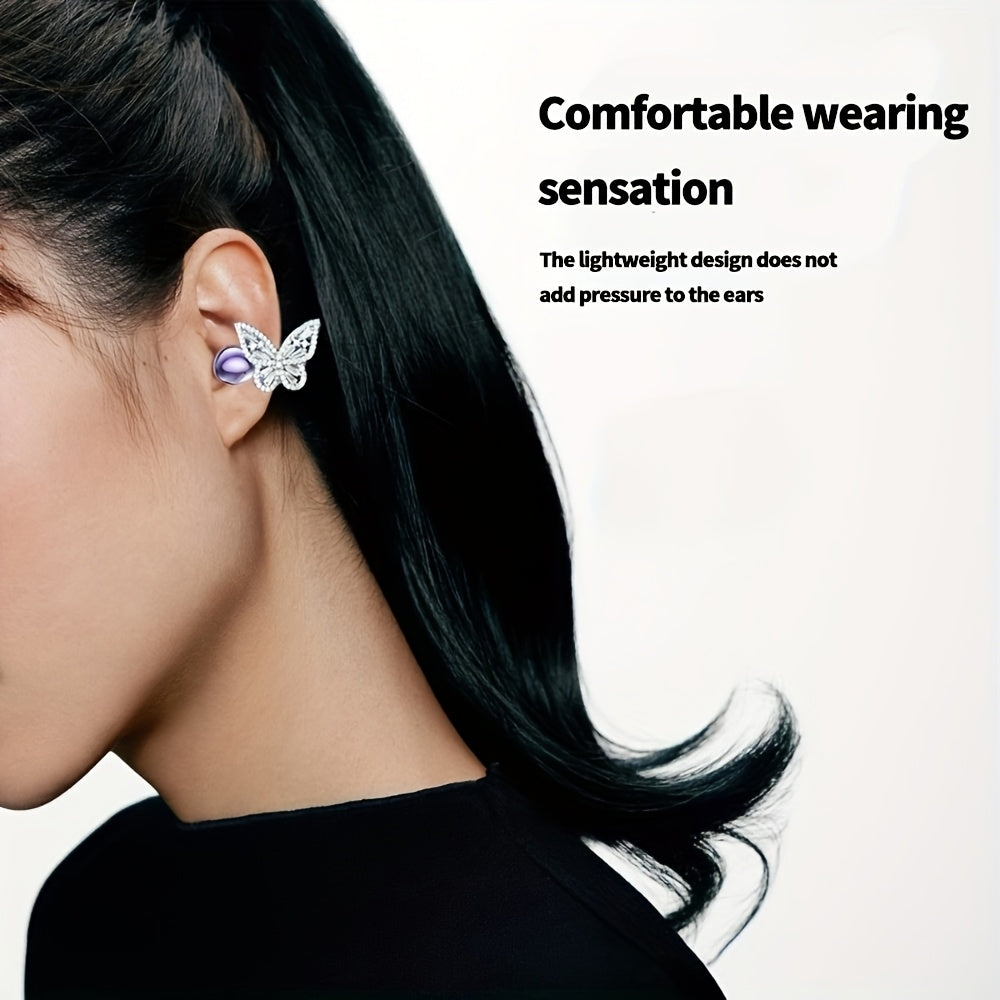 butterfly charm open-ear clip-on earbud worn on the ear, sparkling fashion look in Purple, Beige, Black