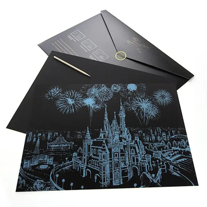 Scratch art paper with a castle design and fireworks, featuring a pencil on a white background.