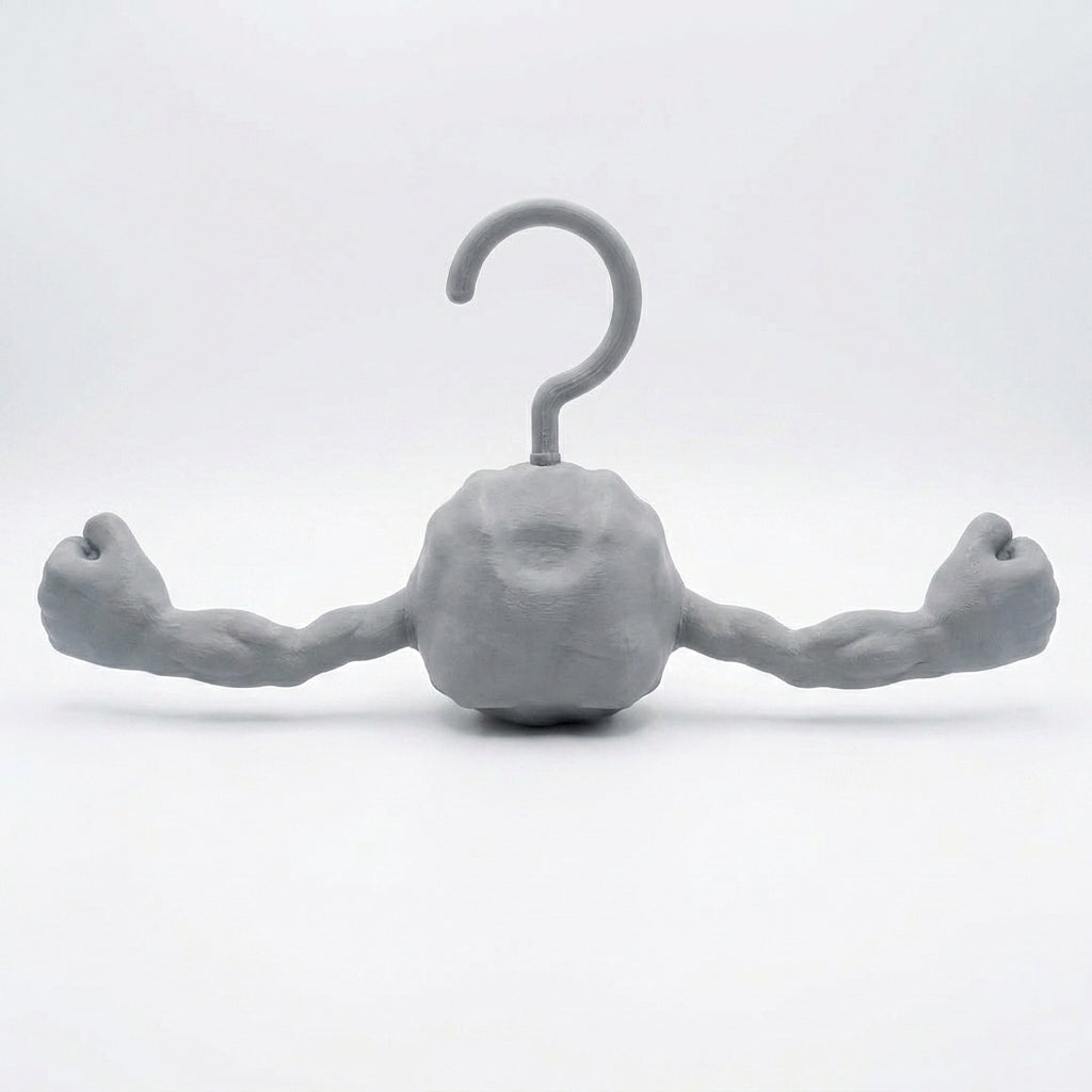 Geodude Pokemon hanger back view showing the rocky stone gray finish, anime rock monster clothes hanger for bedroom closet