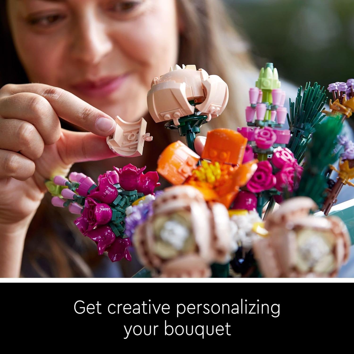 woman personalizing her diy building block bouquet by adding a brick flower, hands-on hobby kit gift for her