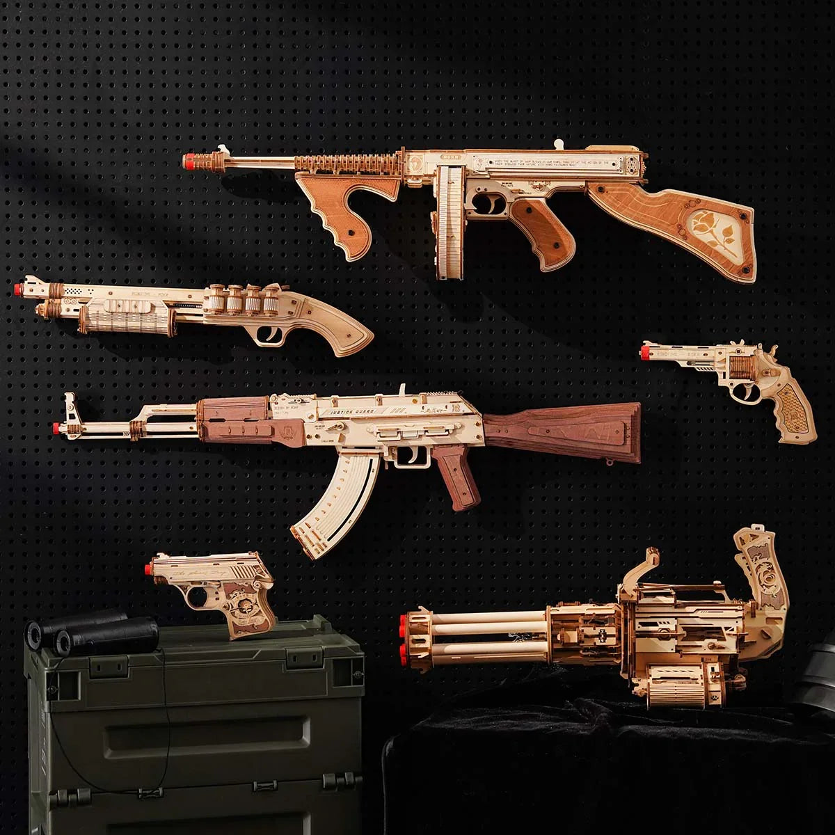 six wooden model kit set displayed on a pegboard for collectors of rubber band mechanisms, Rotating-Barrel+Thompson+AK-47+Terminator+Corsac+Mini Gun
