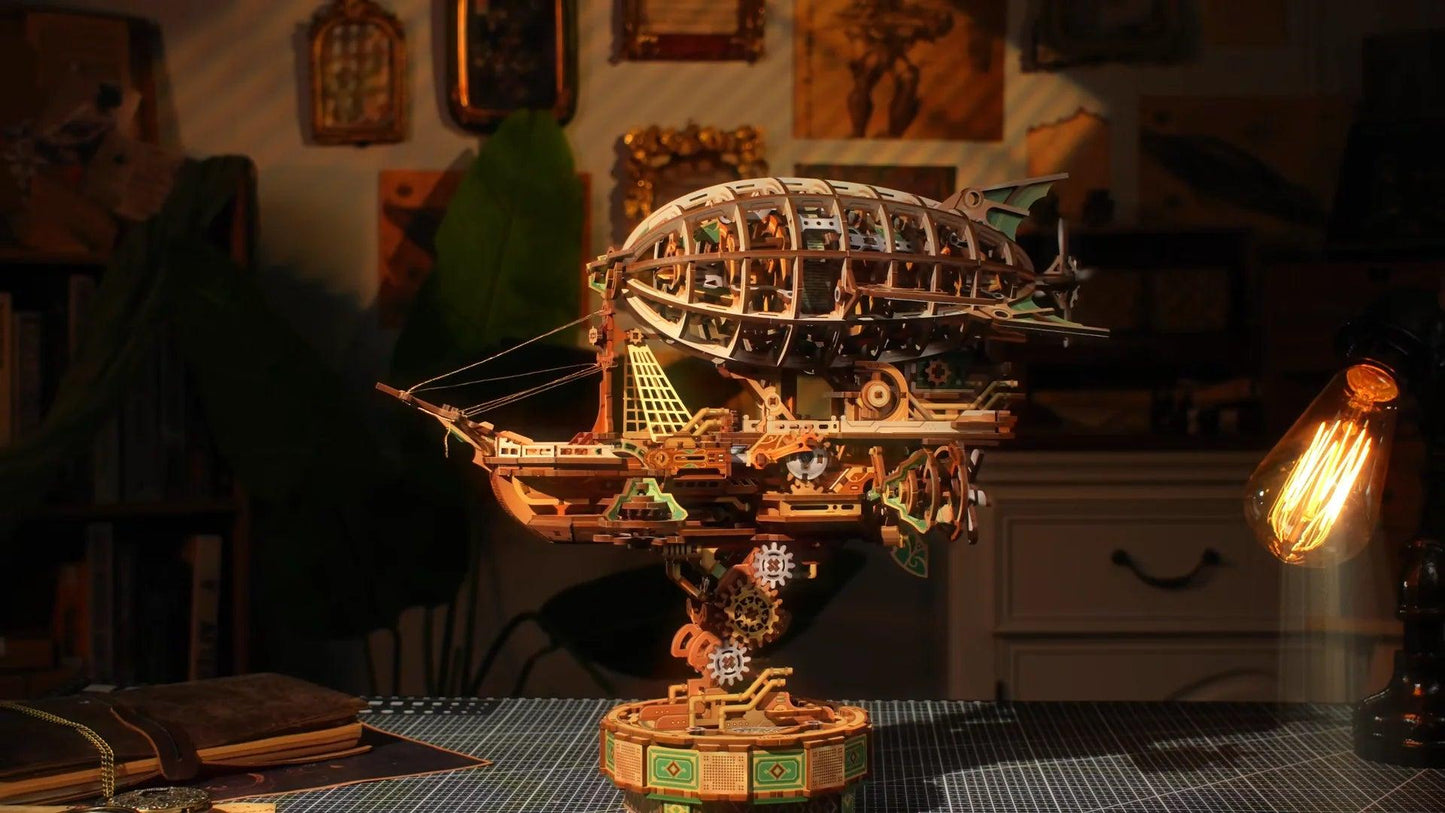 mechanical transmission wooden puzzle airship on a work desk, relaxing screen free build and home office decor piece