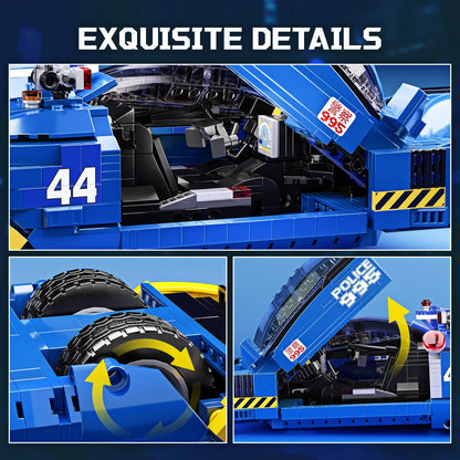 Close-up of a blue toy truck model with intricate details, including wheels and a police-themed design.