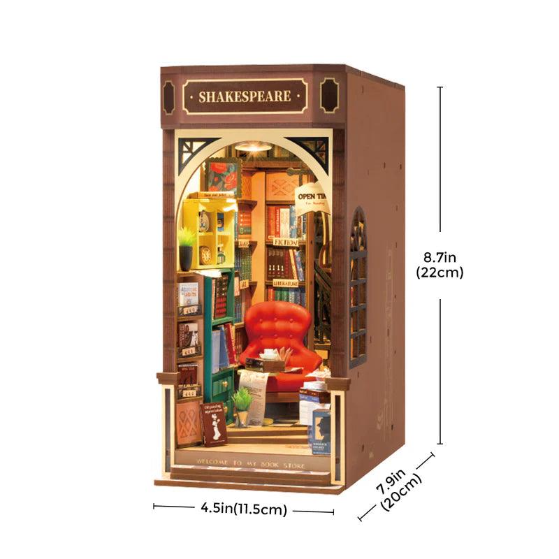 miniature tudor bookshop model with velvet reading chair and timbered facade, book nook kit for adults