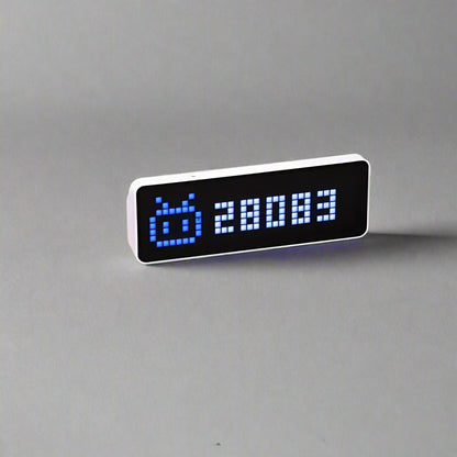 Smart pixel clock followers counter display with LED screen showing social media data, weather, and time