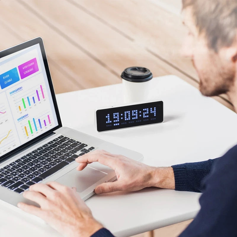 Smart pixel clock followers counter display with LED screen showing social media data, weather, and time