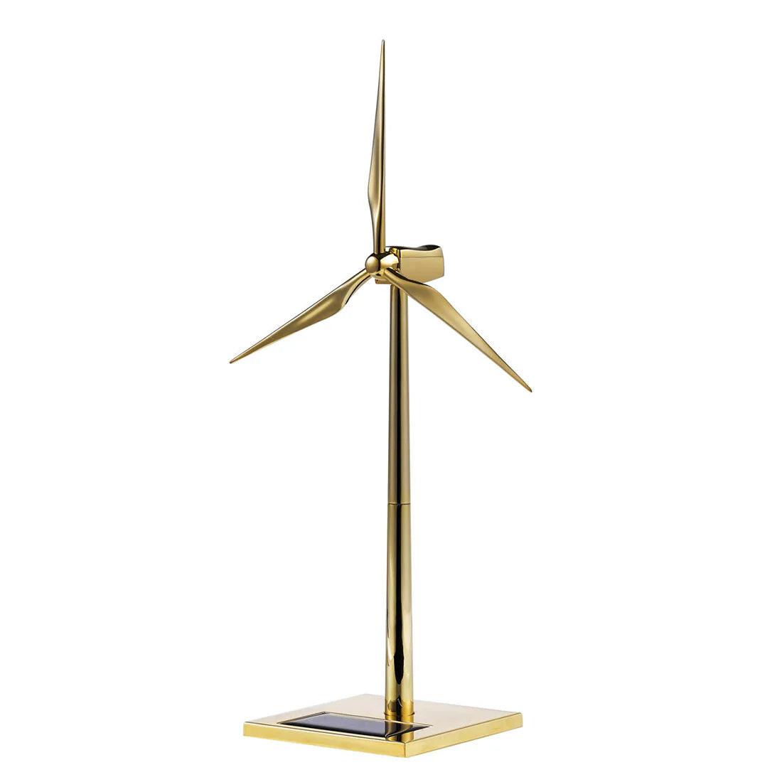 solar powered wind turbine model in gold zinc alloy on a desk, kinetic metal windmill sculpture for a home office