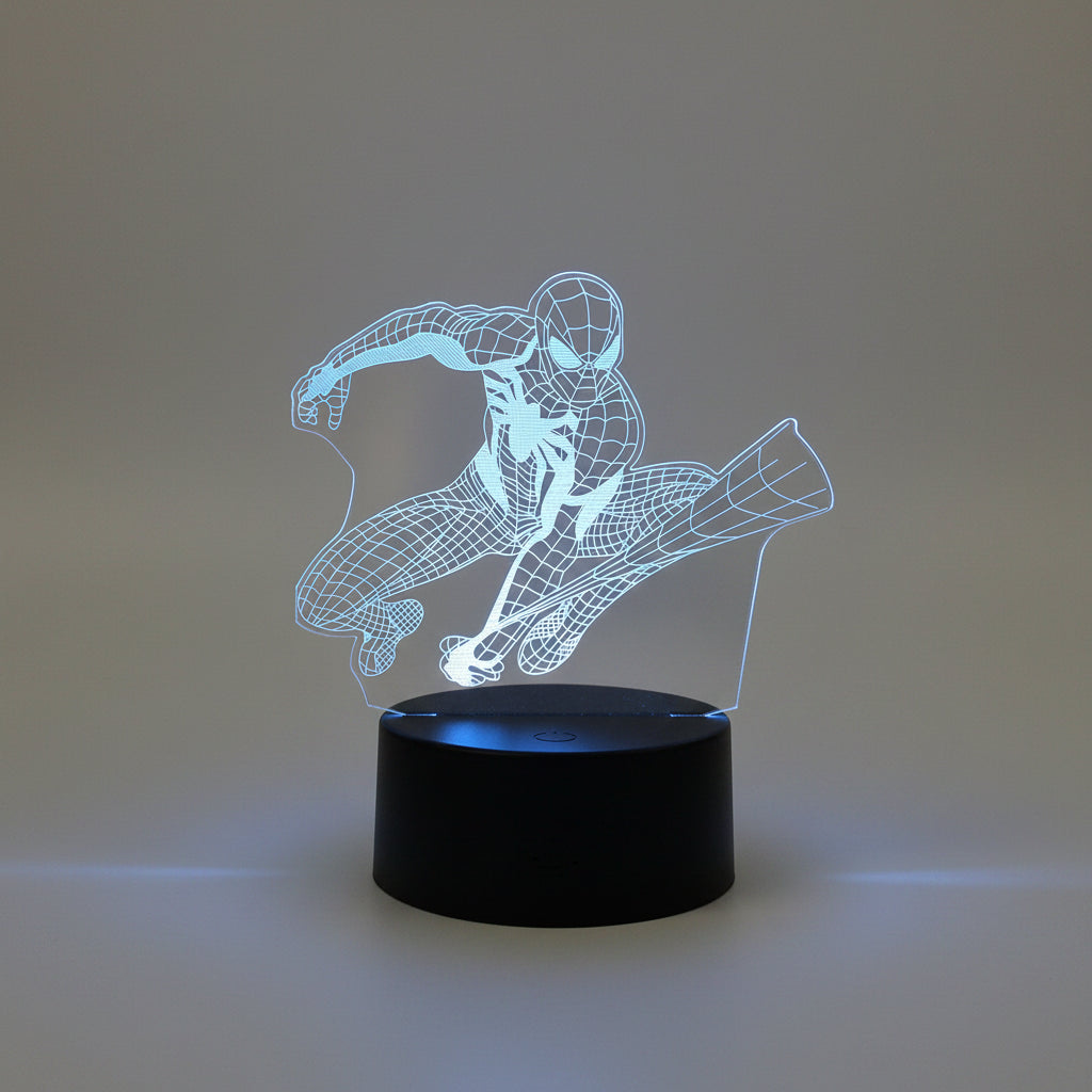 marvel superhero desk lamp lit blue beside a plant, 3d etched acrylic night light gift for a comic book fan, Spider-Man Web Shot