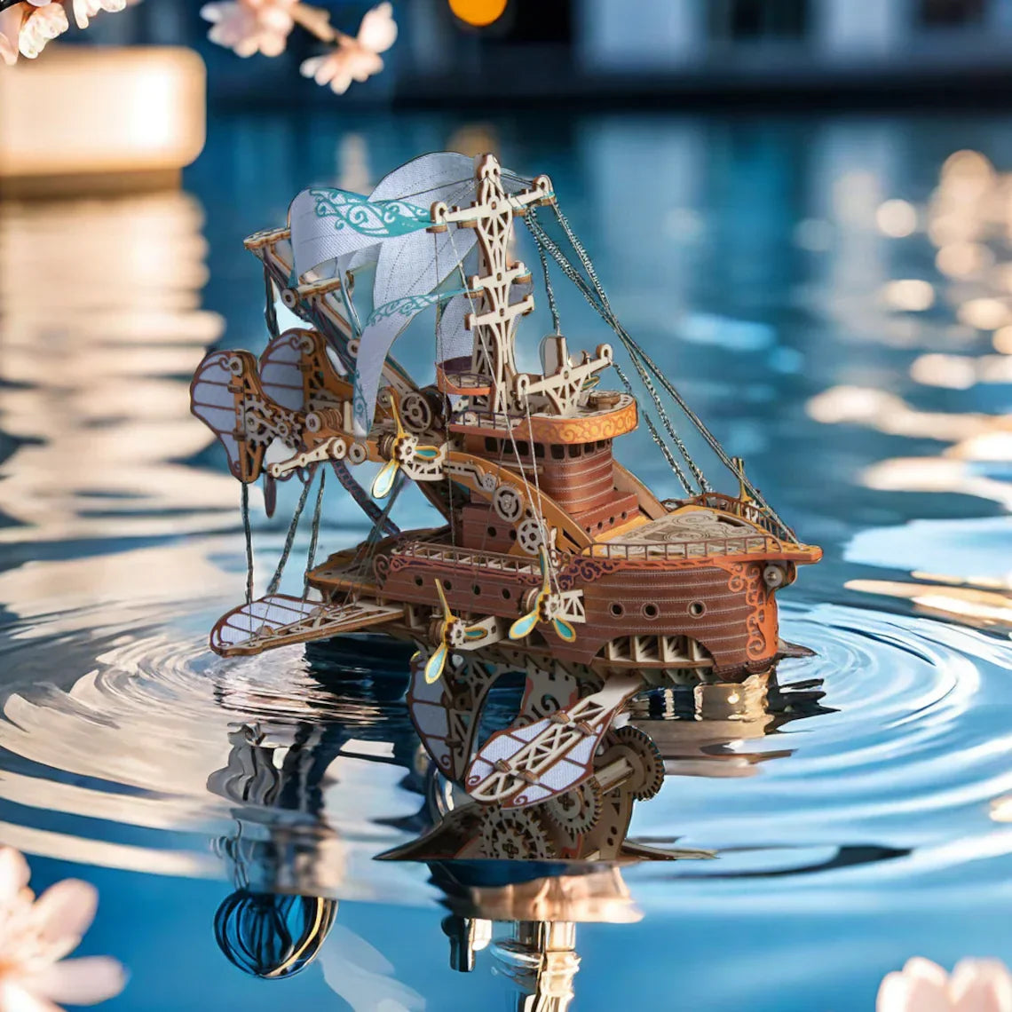 assembled fantasy airship with three pairs of pearl sails and spiral propellers, steampunk shelf centrepiece
