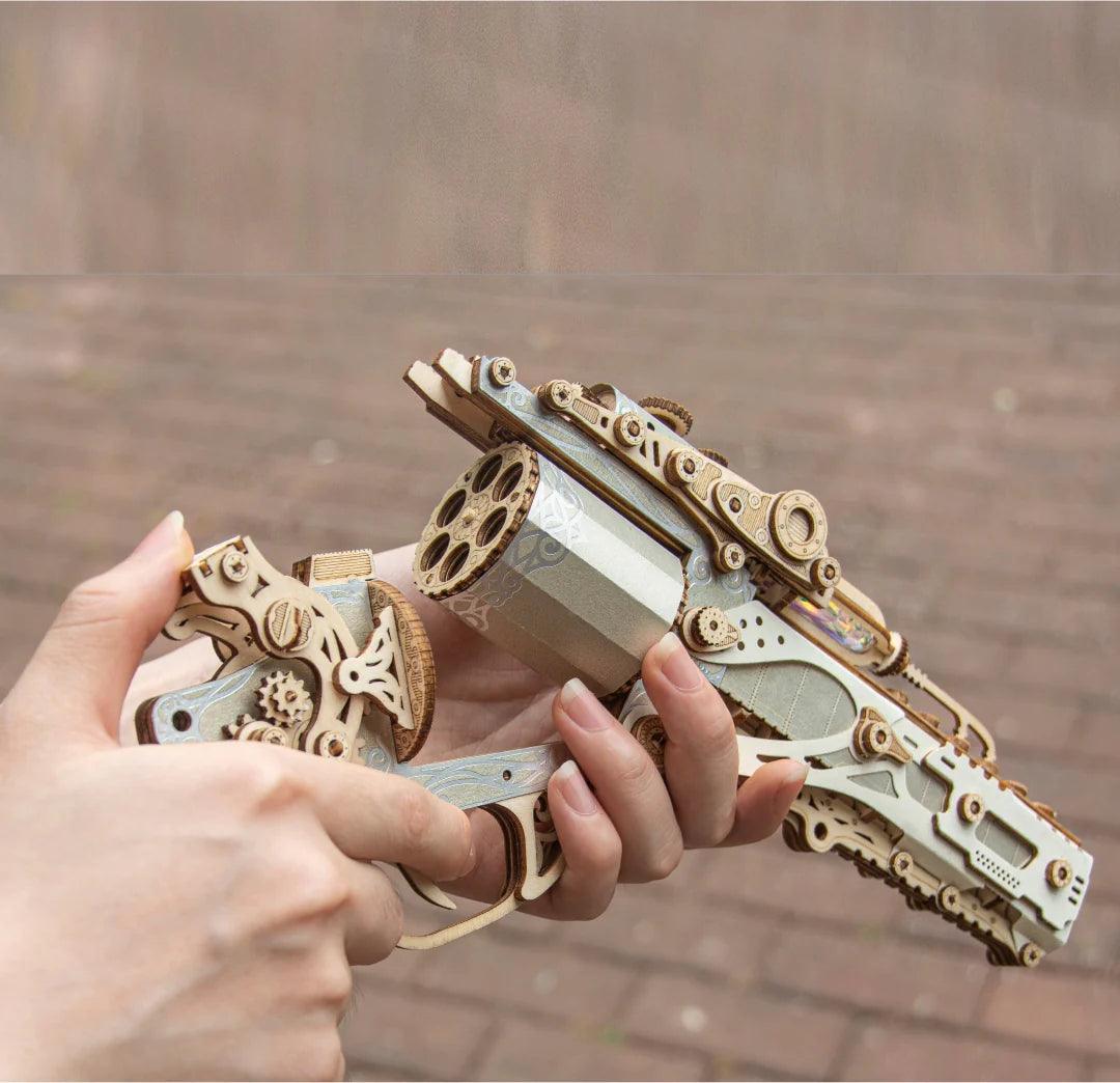 Silver steampunk wooden revolver puzzle in hand, mechanical wood gun model intermediate kit for adult builders — TOYGUNS-1 TOYGUNS-2 TOYGUNS-3 TOYGUNS-4 MOOD1-18580911