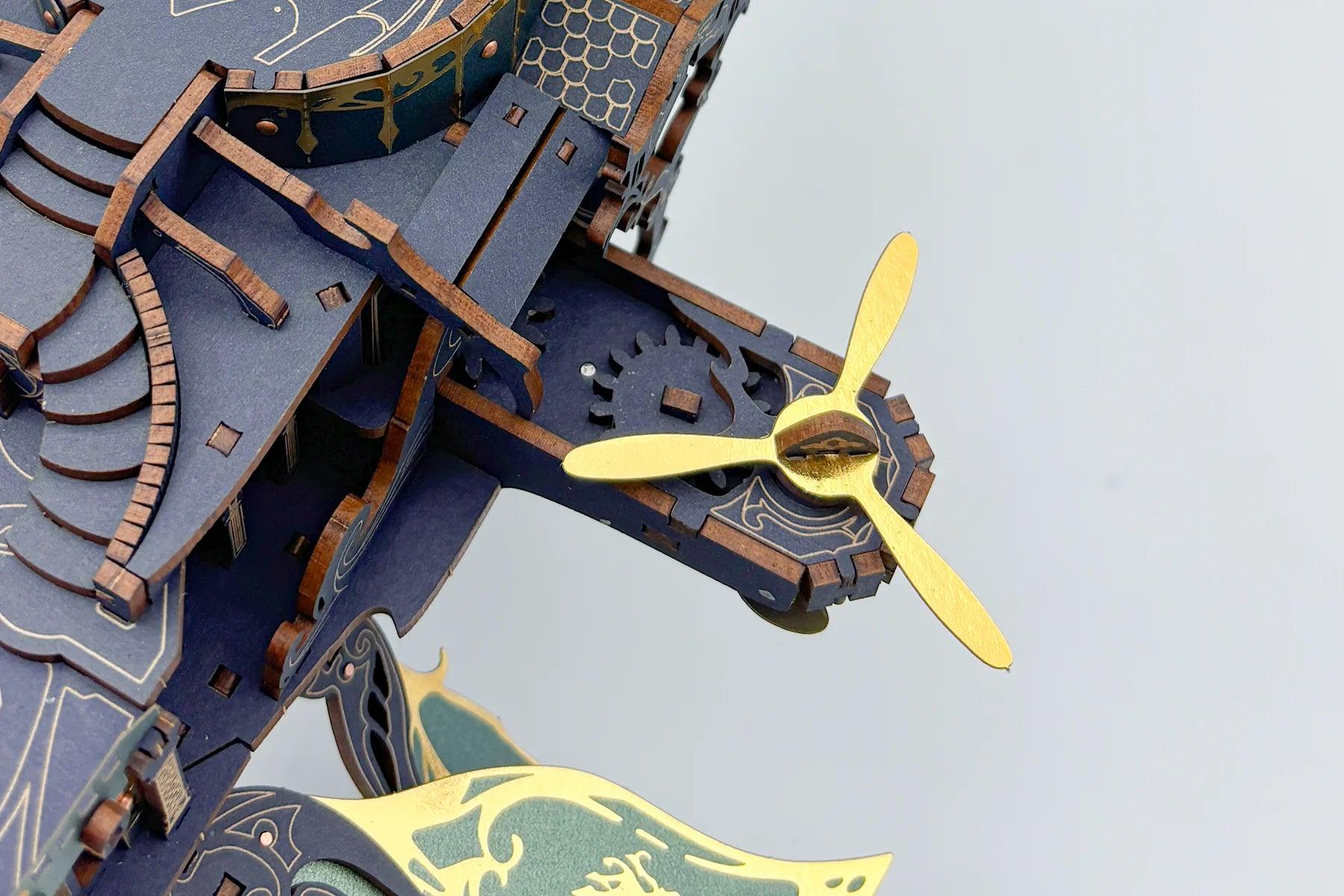 wooden puzzle ship propeller and wing panel detail showing the layered laser cut joinery, Blue