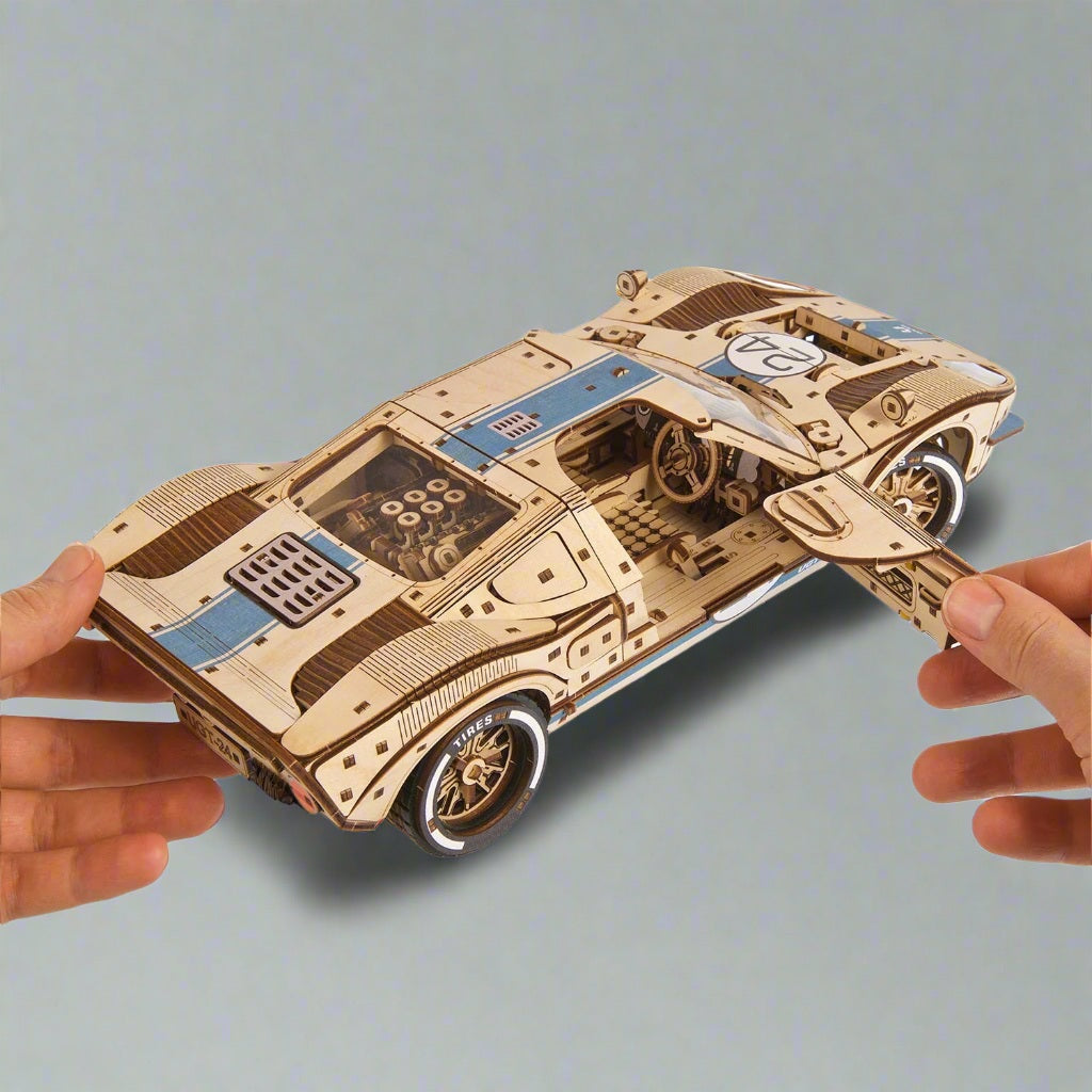 classic endurance prototype car model in natural wood grain, retro racing display model for collectors