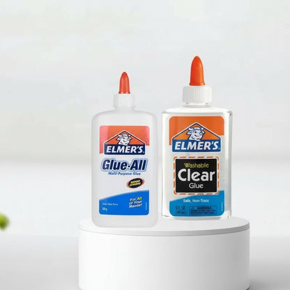 Two bottles of Elmer's glue on a white pedestal with a white background ELMERS-1 ELMERS-2 ELMERS-3 ELMERS-4