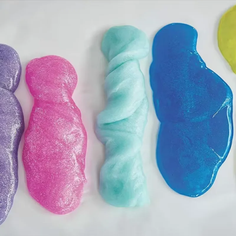 Colorful slime samples on a white background ELMERS-1 ELMERS-2 ELMERS-3 ELMERS-4