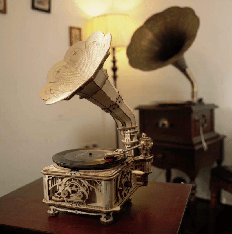vintage wooden gramophone record player decor on shelf with second gramophone vintage music room setting display